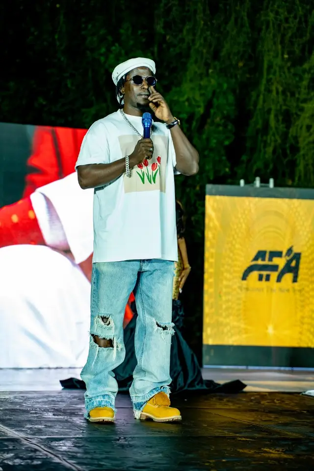 Performer speaking on stage at BIT Expo 2025 Signature Night