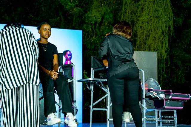 Live makeup demonstration on stage