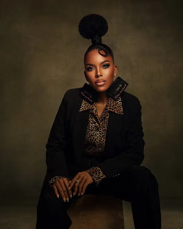 BIT Expo 2026 campaign portrait in leopard print and cassette earrings