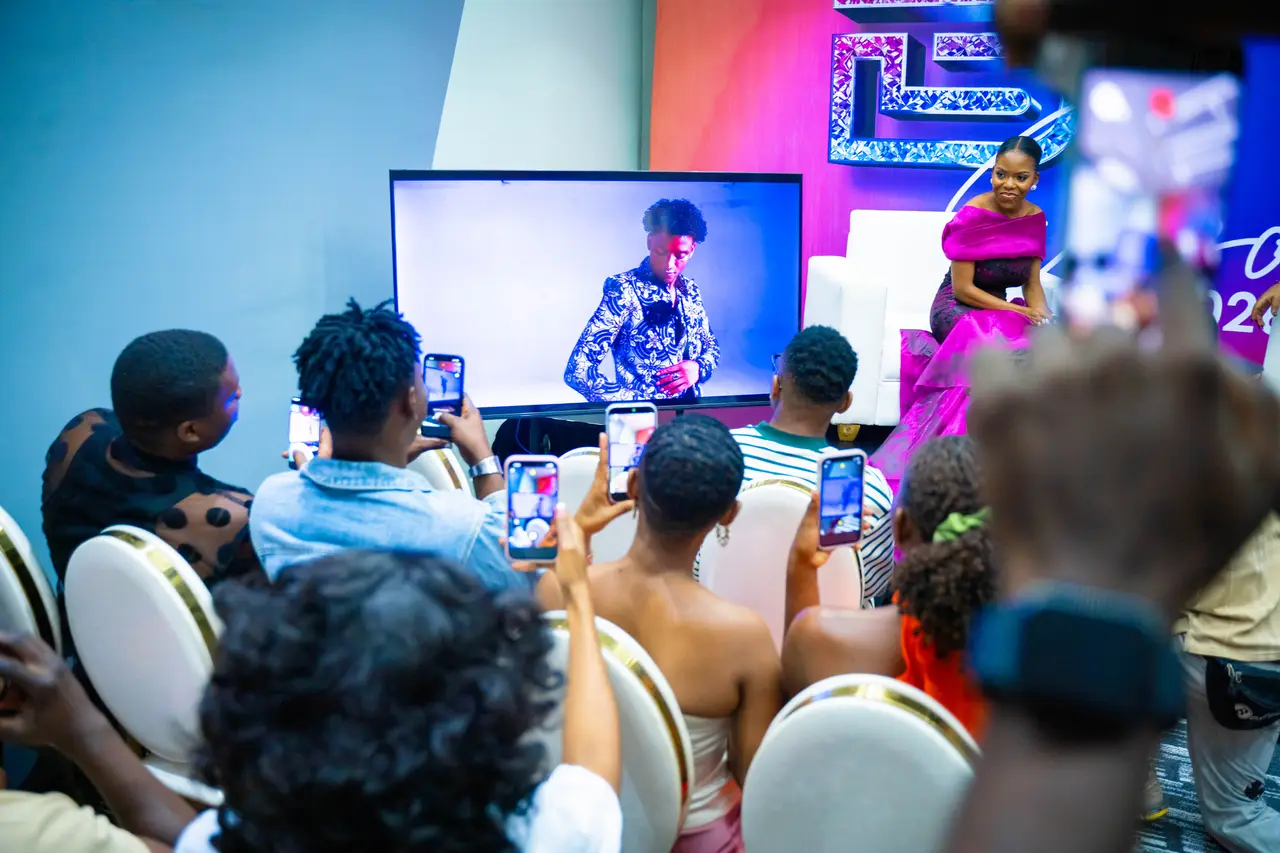 Audience watching the BIT Expo 2026 trailer on screen at the press conference